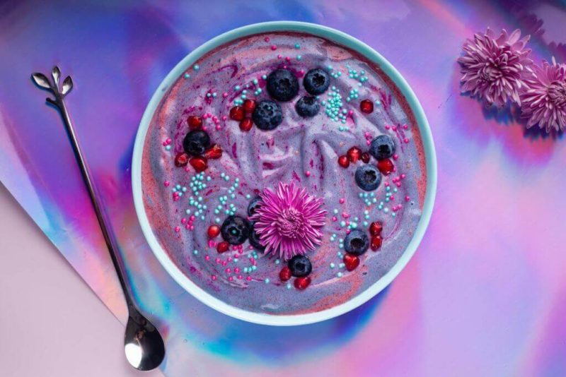 purple and pink swirled unicorn smoothie bowl with berries blogilates 90 day journey recipe